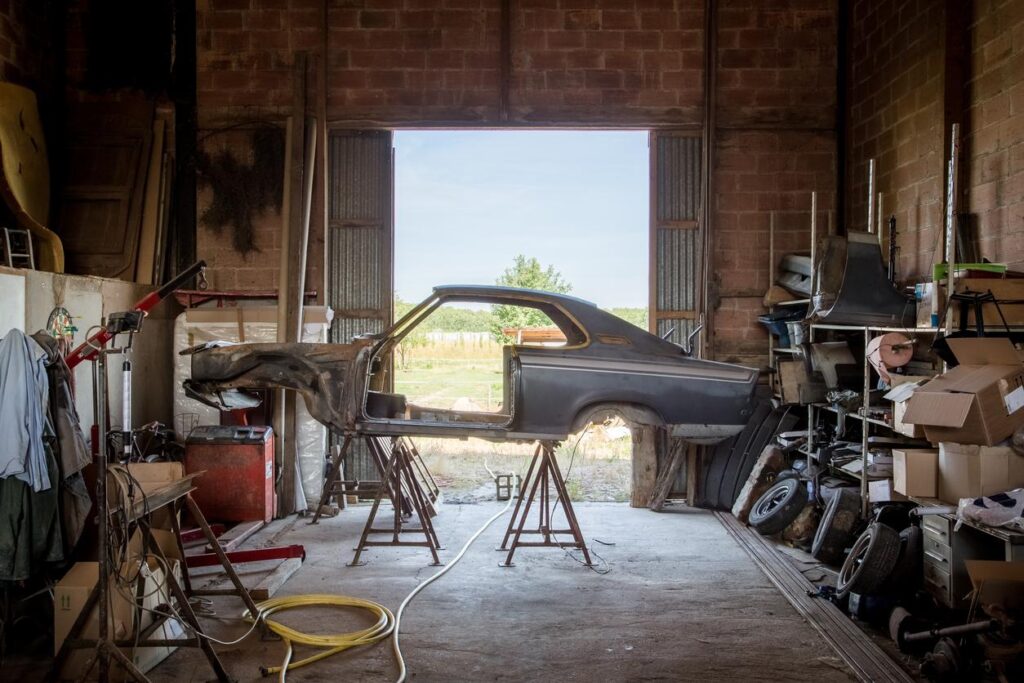 Car restoration for an old coupe.