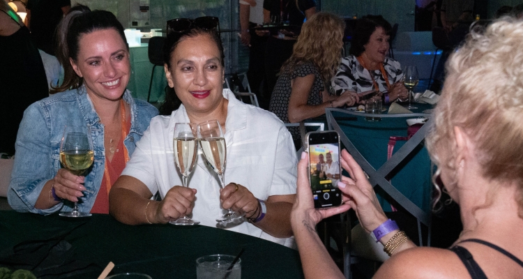 two women posing for picture