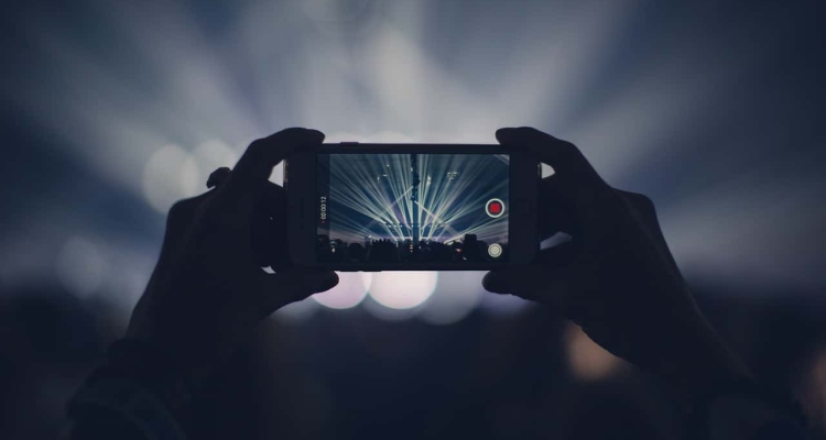 Image by Pexels from Pixabay https://pixabay.com/photos/iphone-concert-lights-stage-lights-1836071/ -- event video marketing