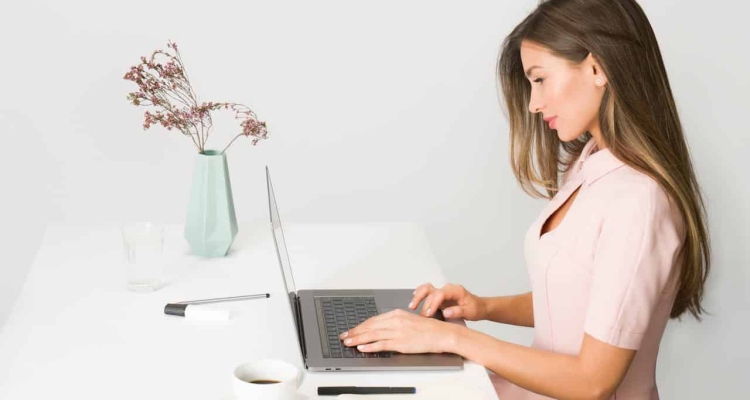 Photo By Moose Photos: Https://Www.pexels.com/Photo/Woman-In-Pink-Dress-Using-Laptop-Computer-1586973/ -- Event Planner