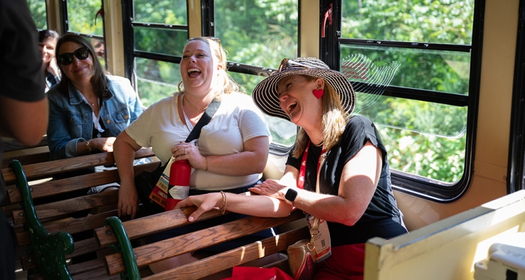 Women On Trolley Laughing