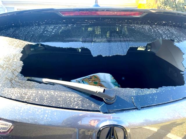 Acura RDX rear window cracked and shattered, defendant