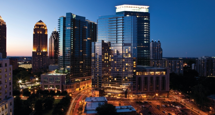 Exterior Of Loews Atlanta Against Skyline