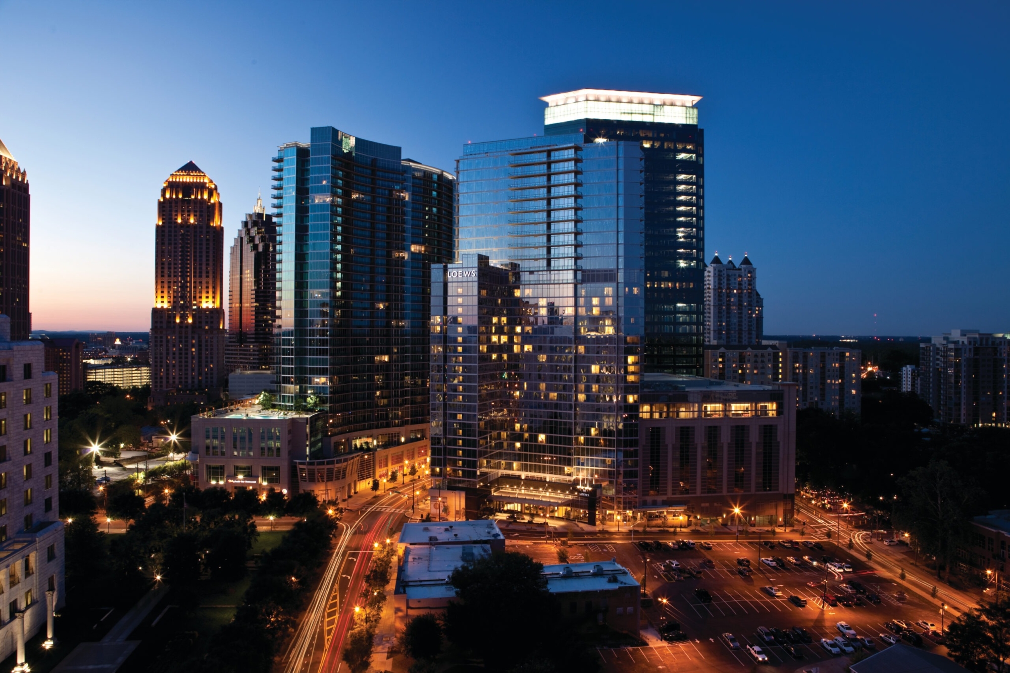 Exterior Of Loews Atlanta Against Skyline