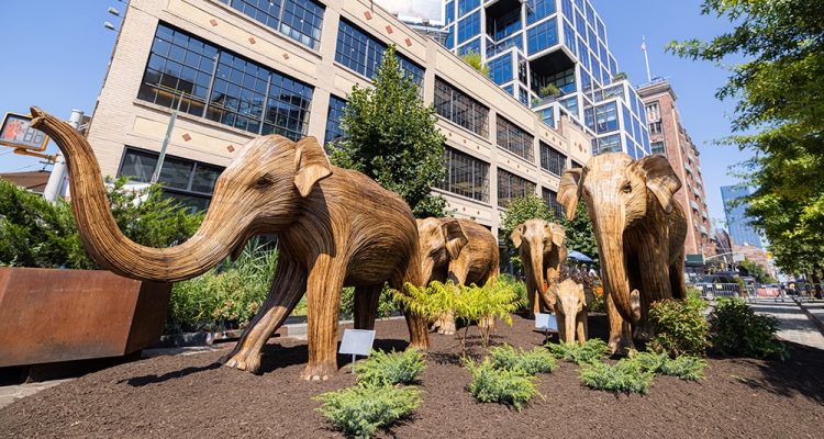 elephant statues in greenery