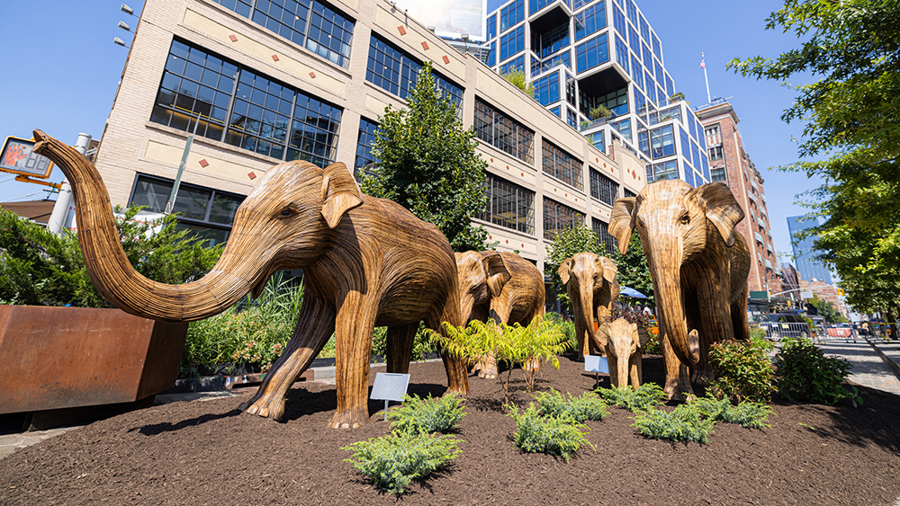 elephant statues in greenery