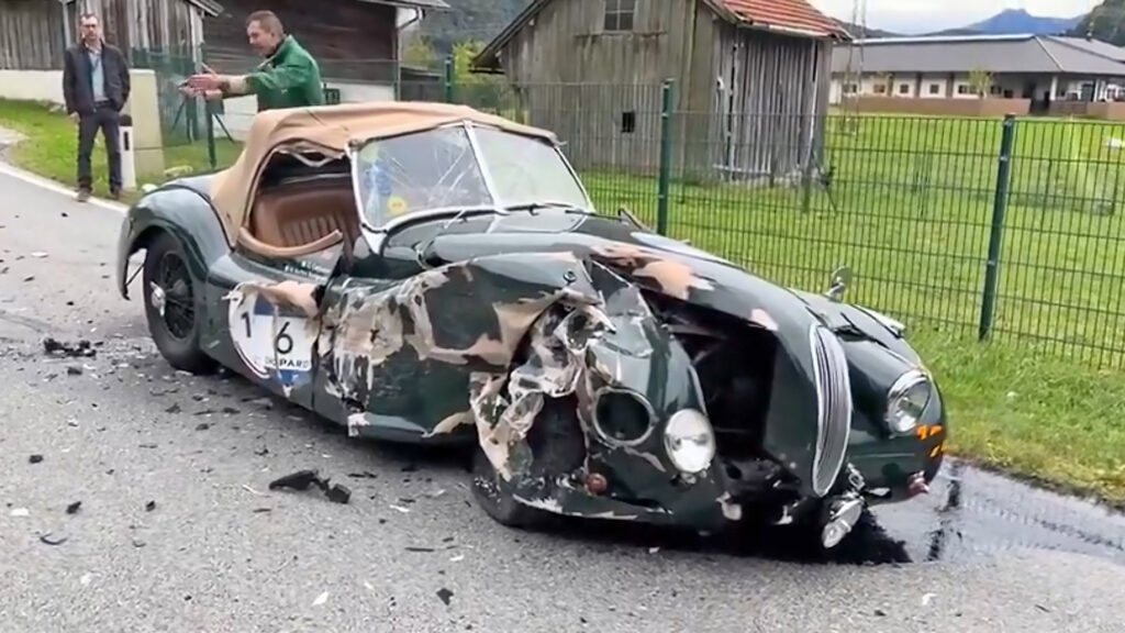  Driver distracted by mobile phone crashes into classic Jaguar XK120, leaving vehicle in ruins