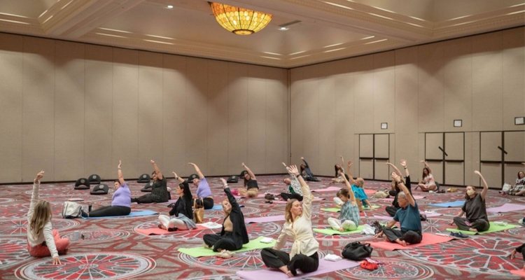 People Doing Yoga In Ballroom