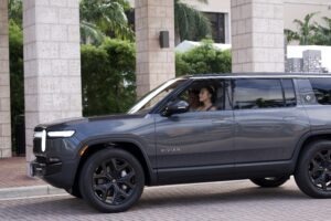 Woman Driving Gray Suv