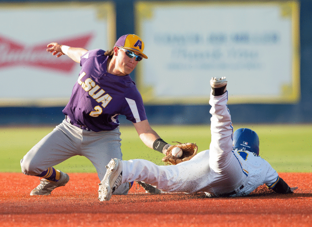 A baseball player was tagged while sliding into base.