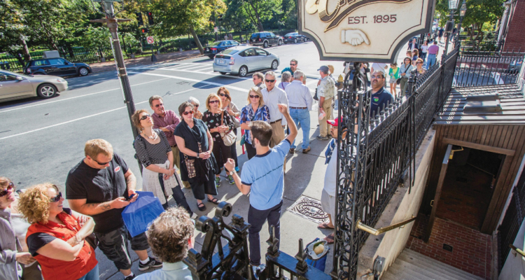 On Location Tours group visiting the famous “Cheers” entrance