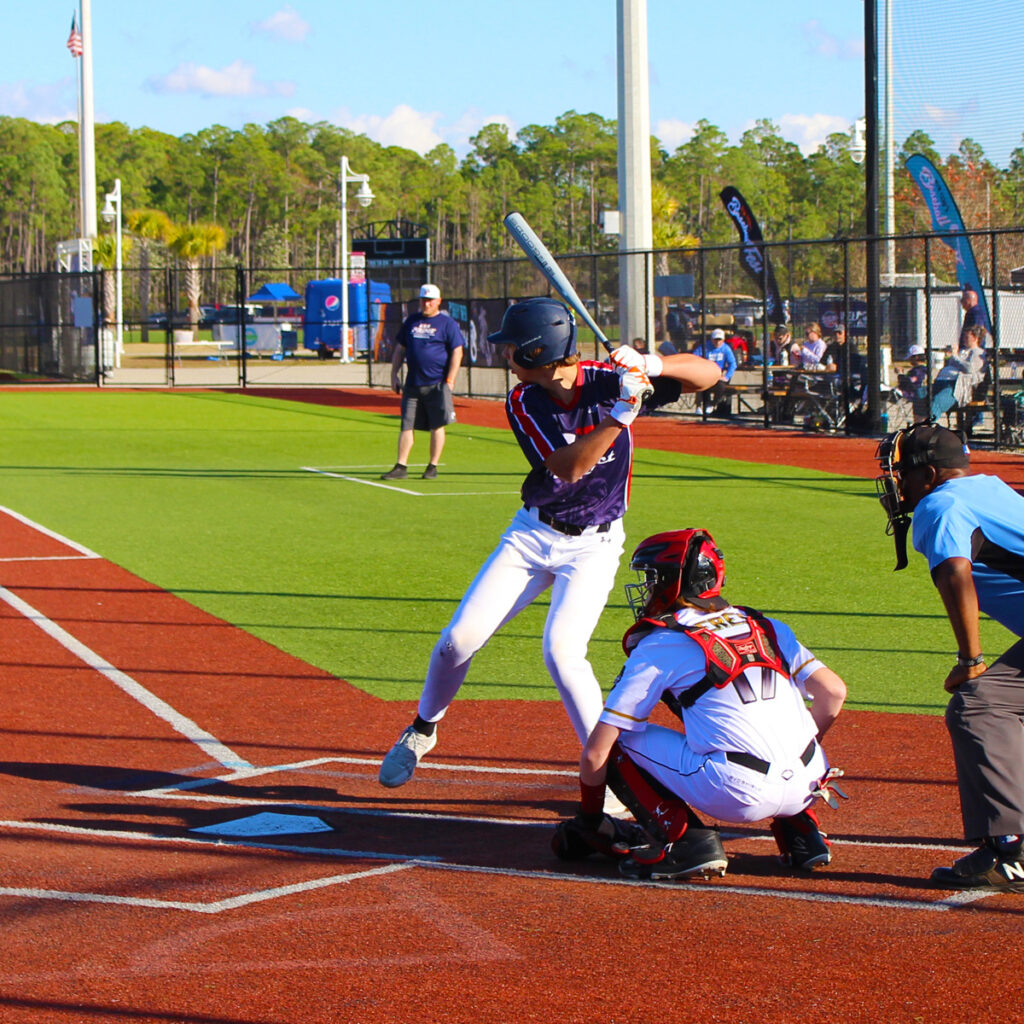 A baseball player bats at a baseball diamond in Panama City.