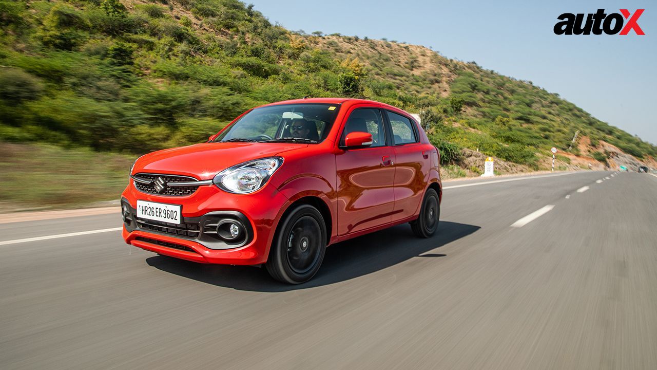 Pure Fire Red Maruti Suzuki Celerio left and front view