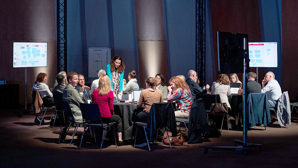 people talking at two tables