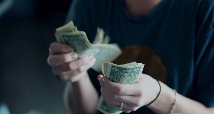 Photo by Alexander Grey on Unsplash https://unsplash.com/photos/focus-photography-of-person-counting-dollar-banknotes--8a5eJ1-mmQ?utm_content=creditCopyText&utm_medium=referral&utm_source=unsplash -- event planning rates; cash