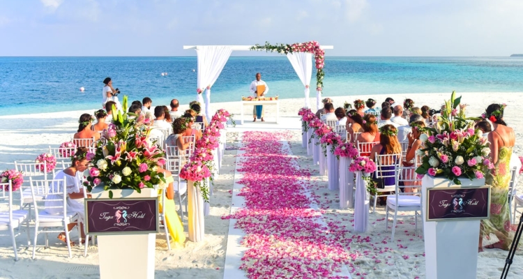 Photo by Asad Photo Maldives: https://www.pexels.com/photo/beach-wedding-ceremony-during-daytime-169198/ -- niche events, destination wedding