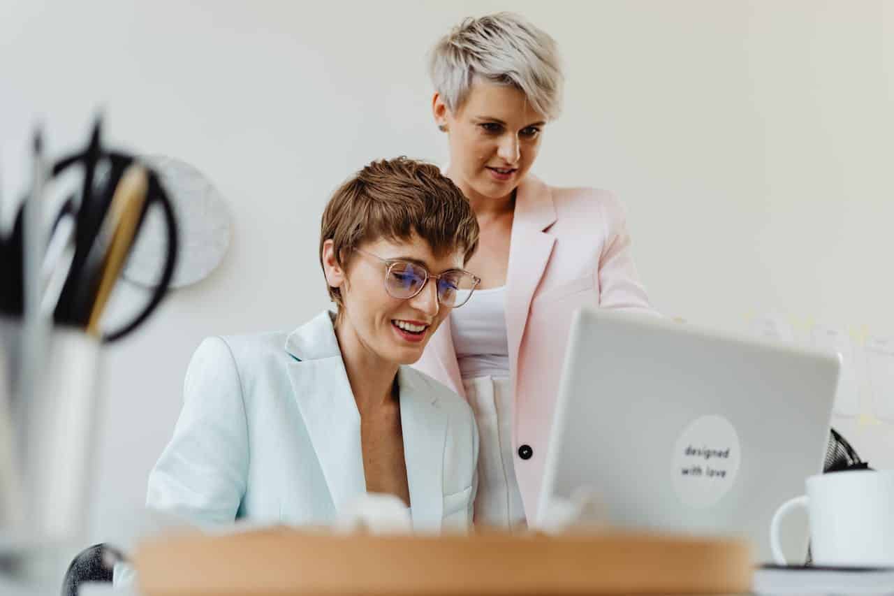 Photo by Photo By: Kaboompics.com: https://www.pexels.com/photo/woman-in-blazers-using-a-laptop-8902237/ -- event planning mentor