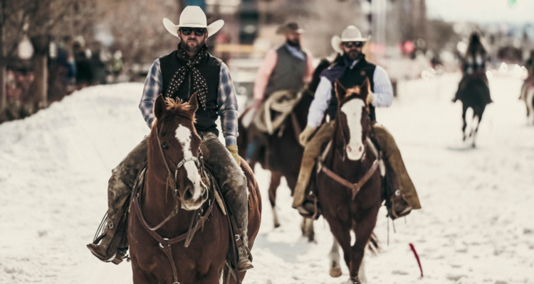 Three people horseback riding in Salt Lake City