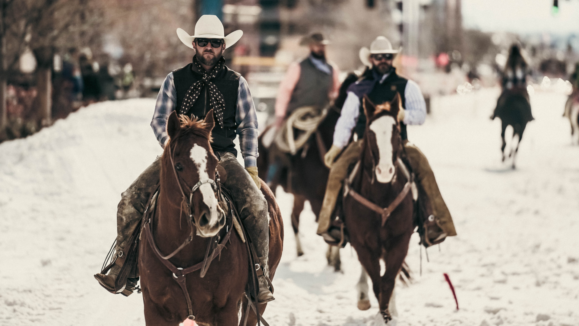 Three people horseback riding in Salt Lake City