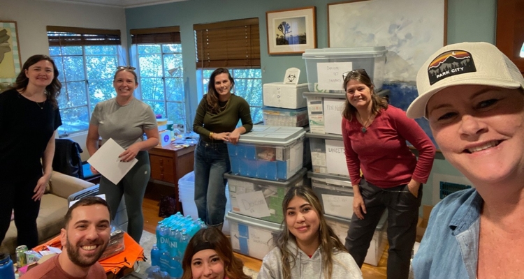 Group of people standing around diabetic supplies